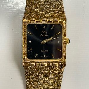 Oleg Cassini Gold Plated Diamond Accent Quartz Watch